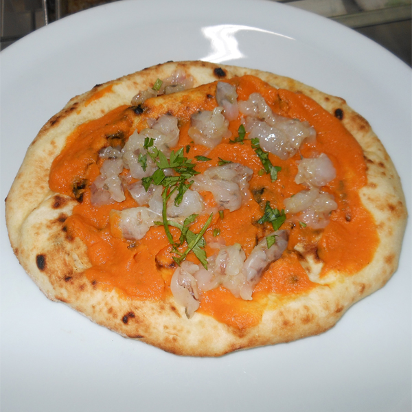 Pizzarella preparata da Vincenzo Esposito e condita da Fabio Ometo presso la Pizzeria Carmnella