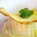 Seppiolina arrosto profumata con zeste di limone, sfusato amalfitano candito su crema di patate, cipollotto nocerino e cialda di pane croccante - -