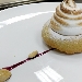 -Biscotto savarin con crema pasticcera e meringa dorata, servita con riduzione al cannonau - -