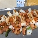 -Calamari grigliati con taccole di bottarga al tonno e farina di bottarga al muggine - -