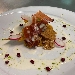 -Cips di polenta integrale con crema di radicchio e noci, servite con bacon, salsa al pecorino e chicchi di melograno - -