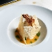 -Coulis di pachino giallo, mousse di ricotta e burrata con cialda al pecorino e carciofo croccante DOP sardo in salsa verde - -