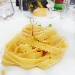 -Fettuccelle di Gerardo di Nola aglio e olio e noci, julienne di calamaretti di rete e pomodoro giallo - -