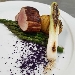 -Filetto di maiale affumicato con asparagi al burro, patate hasselback, cipollotto piastrato e polvere di cavolo viola - -