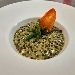 -Fregola al nero di seppia con battuto di asparagi e nocciole tostate - -