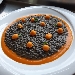 -Fregola al nero di seppia con sferificazione di zucca al lime - -