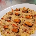 -Fregola risottata con cozze e pepite di piselli - -