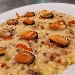 -Fregola risottata con cozze e pepite di piselli - -