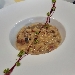 -Fregola sarda ai funghi con pepite di piselli e riduzione al carignano DOC - -