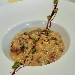 -Fregola sarda ai funghi con pepite di piselli e riduzione al carignano DOC - -