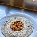 -Risotto con crema di gorgonzola, salmone e lime servito con bottarga e melograno - -