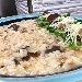 -Risotto con funghi misti e anguilla affumicata del sulcis - -