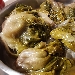 -Scarola ripiena con seppie, noci e pinoli  - -