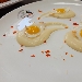 -Uova di quaglia all'occhio di bue su crema di cipolla e patate - -