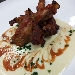 Costine di maiale con crema di porri - -
