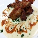 Costine di maiale con crema di porri - -