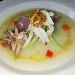 Crema parmentier e seppia scottata alle noci servita con ortaggi croccanti  - -