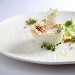 Flan di Pecorino Romano DOP con crema di fave cruda e polvere di pane e guanciale - -