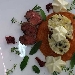 Geometria di duetto di riso e verza su salsa di peperone rosso prufumata al basilico, spuma di ricotta di bufala ai sentori di agrumi e cuore di stinco di annutolo scottato alle erbe aromatiche. - -