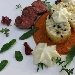 Geometria di duetto di riso e verza su salsa di peperone rosso prufumata al basilico, spuma di ricotta di bufala ai sentori di agrumi e cuore di stinco di annutolo scottato alle erbe aromatiche. - -