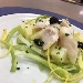 Insalata di merluzzo con patate servito con semi di papavero - -