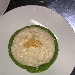 Risotto allo champagne con crema di broccoli baresi e croccante di patate paglia - -