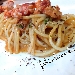 Spaghetti con astice, emulsione di ricci e polvere di caff - -