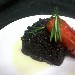 Riso venere nero al profumo di rosmarino e pomodoro in confit - -