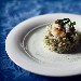 -risotto alla rana pescatrice , alghe di mare pepe bianco e scorzetta di limone fresca. - -