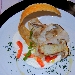 Scaloppine di Spigola e Porcini su Crema Acidula di Formaggio Sfogliatina di Parmigiano e Filetti di Pomodoro Fresco - -